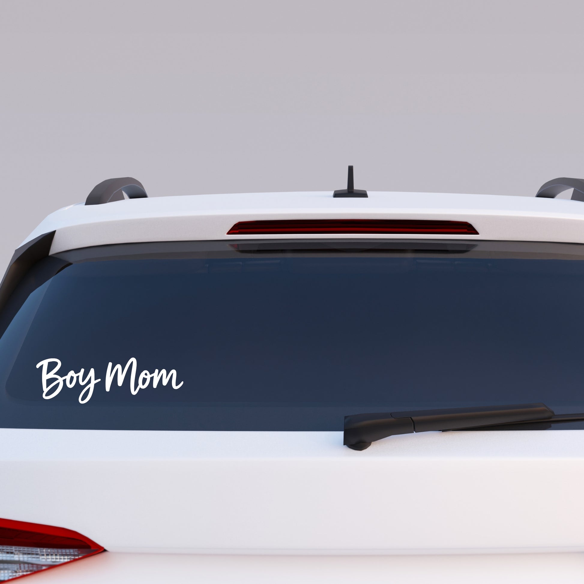 Boy Mom car decal applied to rear window