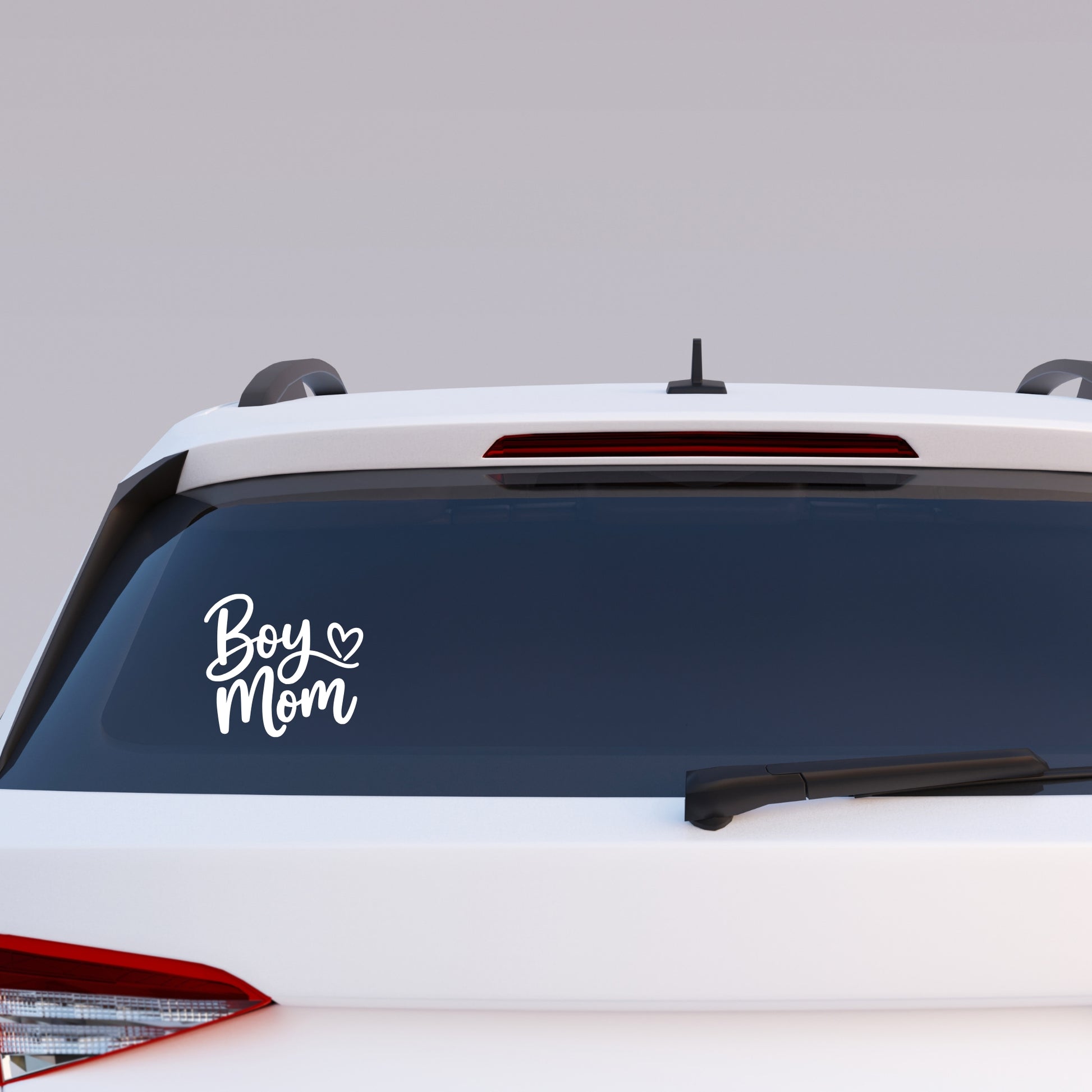 Boy Mom vinyl decal applied to car window