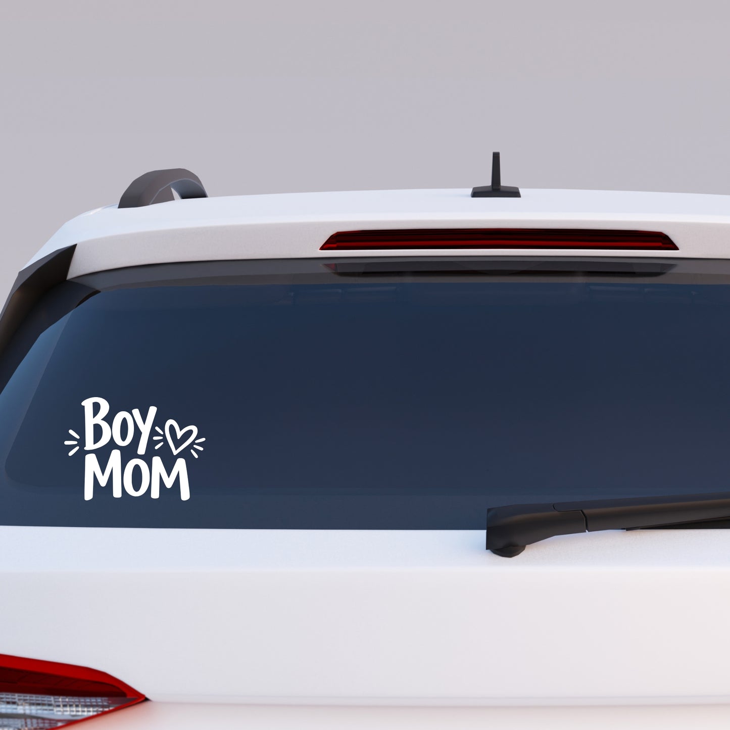 Boy Mom window decal applied to car rear window